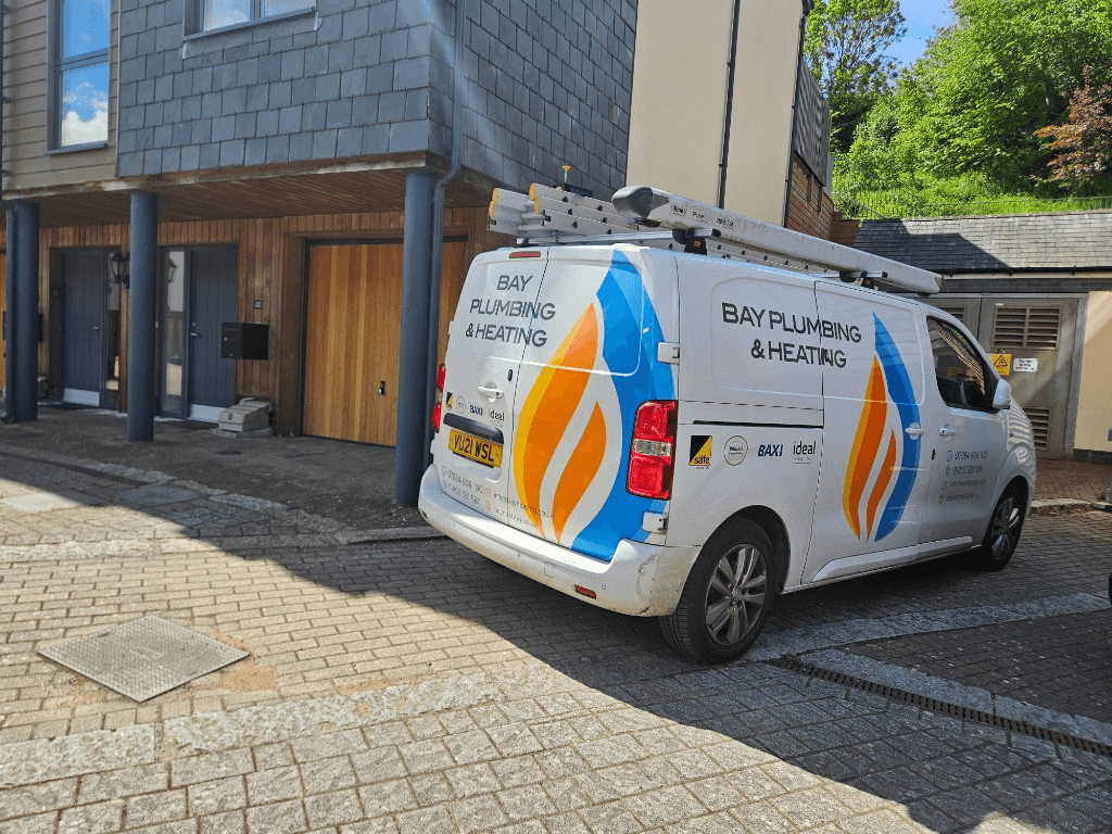 Bay Plumbing & Heating branded van outside a local Torbay property — boiler installation specialists