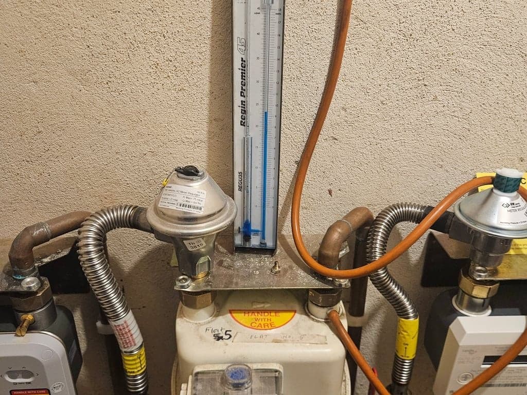 Gas meter working pressure check during boiler service in Torquay